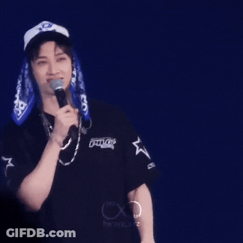 Man Wearing Hat Holding Microphone GIF