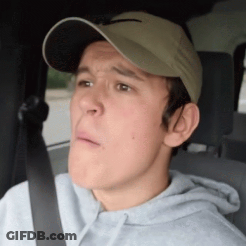 Man Wearing Hat Making Funny Face GIF