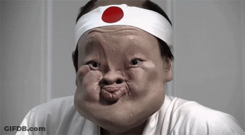 Man Wearing Headband With Red Circle GIF