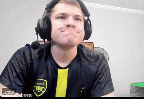 Man Wearing Headphones And Arsenal Shirt GIF
