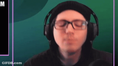 Man Wearing Headphones And Beanie GIF