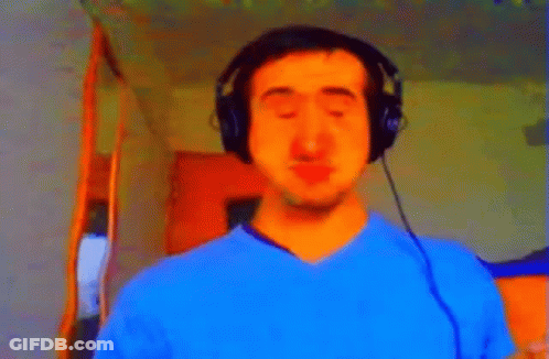 Man Wearing Headphones And Blue Shirt GIF