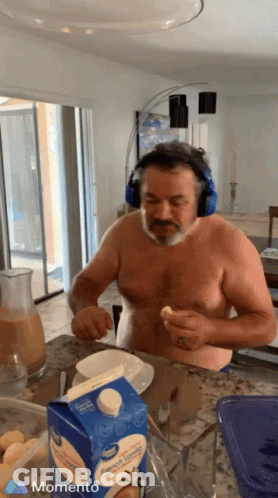 Man Wearing Headphones And French Vanilla Creamer GIF