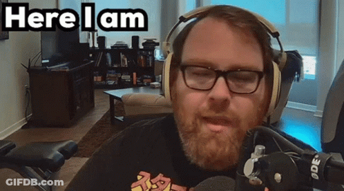 Man Wearing Headphones And Glasses Says Here I Am GIF