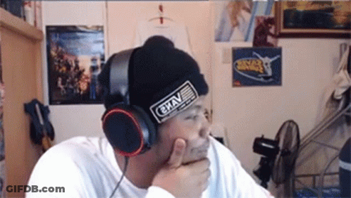 Man Wearing Headphones And Grav Beanie GIF