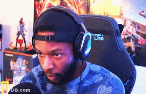 Man Wearing Headphones And Hat In Pure Lab Chair GIF
