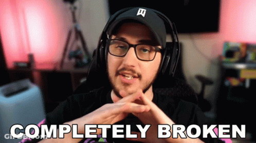 Man Wearing Headphones And Hat Says Completely Broken GIF