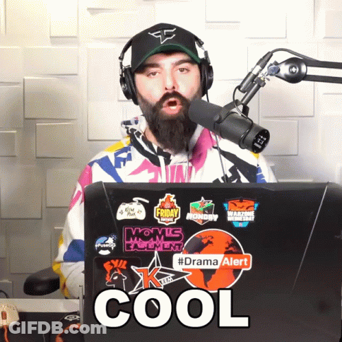 Man Wearing Headphones And Hat Stands In Front Of Microphone And Laptop Cool GIF