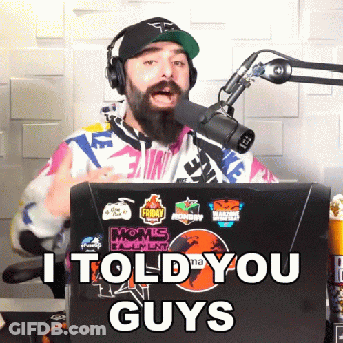 Man Wearing Headphones And Hat Talking Into Microphone Says It Told You Guys GIF