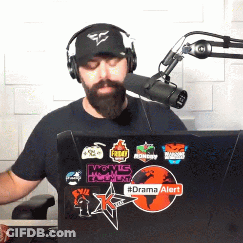 Man Wearing Headphones And Hat With Drama Alert Laptop GIF