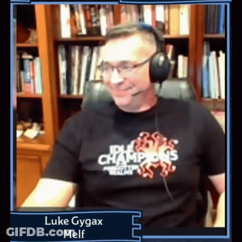 Man Wearing Headphones And Idle Champions T-Shirt GIF