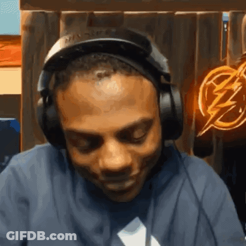 Man Wearing Headphones And Lightning Bolt Shirt GIF