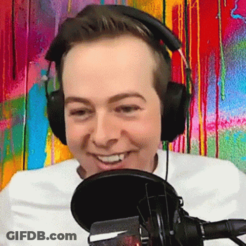 Man Wearing Headphones And Microphone Smiling GIF