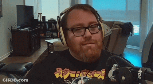Man Wearing Headphones And Ode Shirt GIF