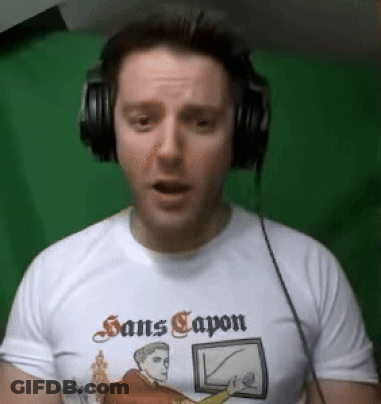 Man Wearing Headphones And Sans Capon Shirt GIF