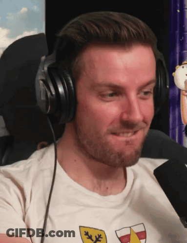 Man Wearing Headphones And Shield T-Shirt GIF
