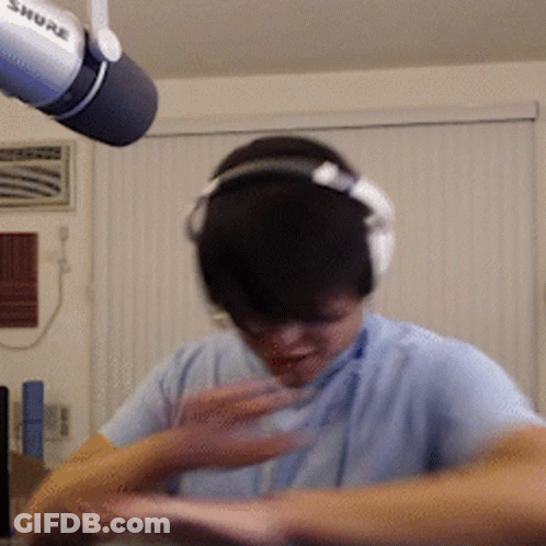 Man Wearing Headphones And Shure Microphone GIF