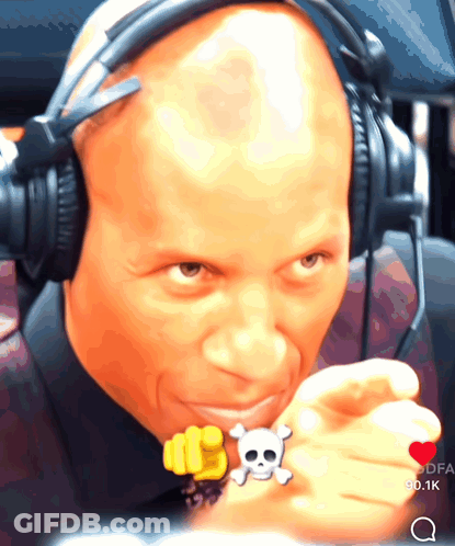 Man Wearing Headphones And Skull Ring GIF