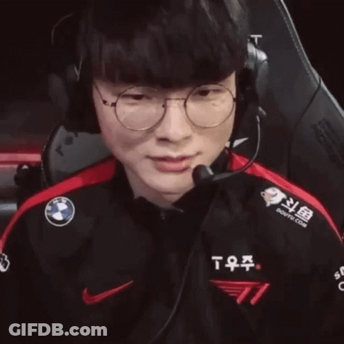 Man Wearing Headphones And T11 Shirt GIF