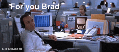 Man Wearing Headphones At Desk GIF