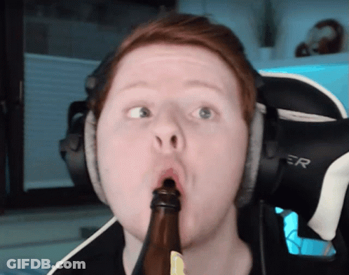 Man Wearing Headphones Holding Bottle GIF