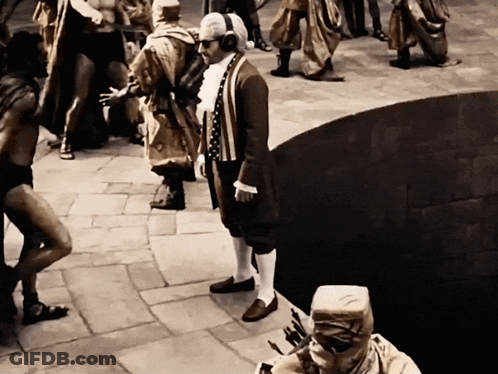 Man Wearing Headphones In Front Of Crowd GIF