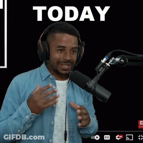 Man Wearing Headphones In Front Of Microphone GIF