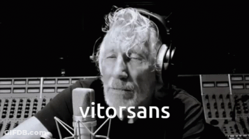 Man Wearing Headphones In Front Of Microphone GIF
