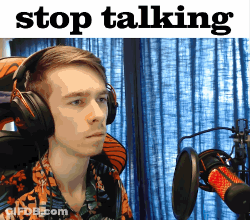 Man Wearing Headphones In Front Of Microphone GIF