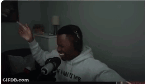 Man Wearing Headphones In Front Of Microphone GIF