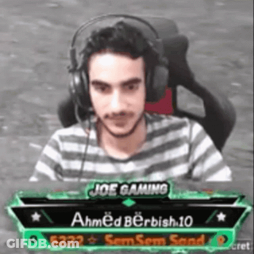 Man Wearing Headphones In Front Of Screen Saying Joe Gaming Ahmed Berbish 10 GIF