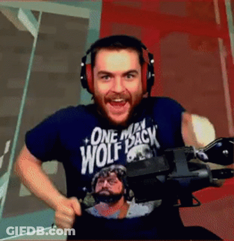 Man Wearing Headphones In One Man Wolf Pack Shirt GIF
