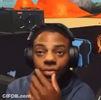 Man Wearing Headphones Looking At Camera With Weapon GIF