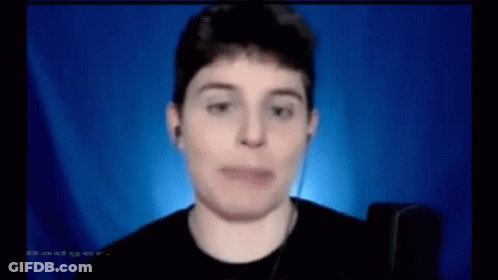 Man Wearing Headphones Making Funny Face At Microphone GIF