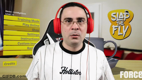 Man Wearing Headphones Playing Video Game GIF