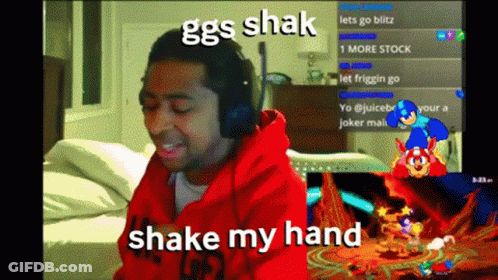 Man Wearing Headphones Playing Video Game Says Shake My Hand GIF