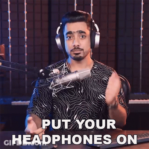Man Wearing Headphones Saying Put Your Headphones On GIF