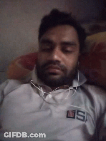 Man Wearing Headphones Saying US GIF