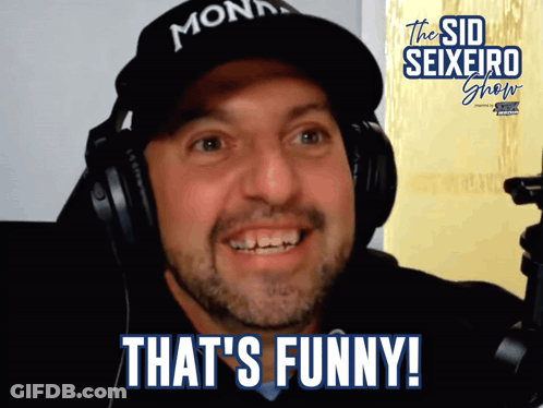 Man Wearing Headphones Says That's Funny GIF