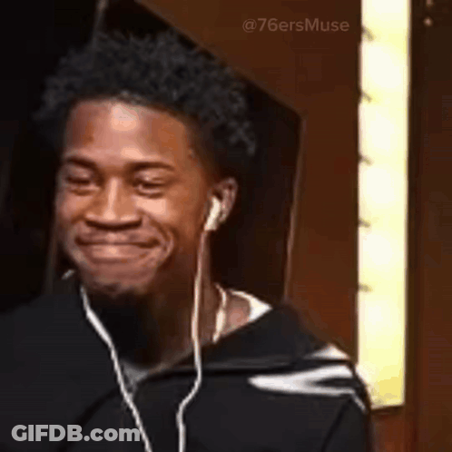 Man Wearing Headphones Singing GIF