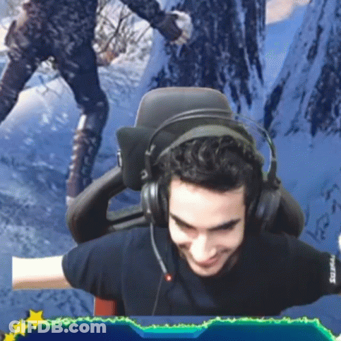Man Wearing Headphones Sits In Chair GIF