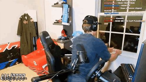 Man Wearing Headphones Sitting By Window GIF