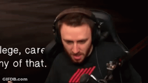 Man Wearing Headphones Sitting In Chair GIF