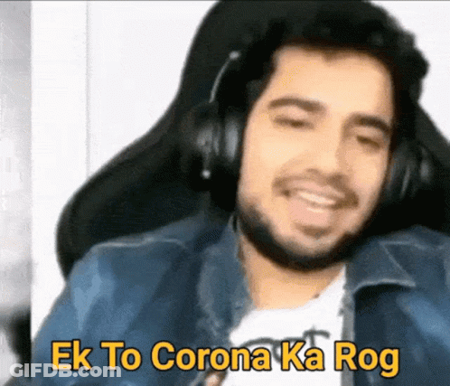 Man Wearing Headphones Sitting In Chair Smiling GIF