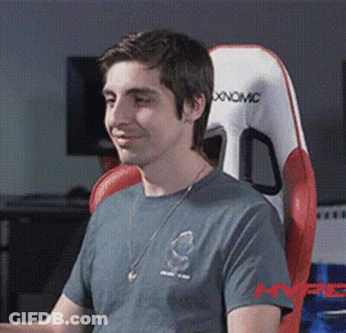 Man Wearing Headphones Sitting On Couch GIF