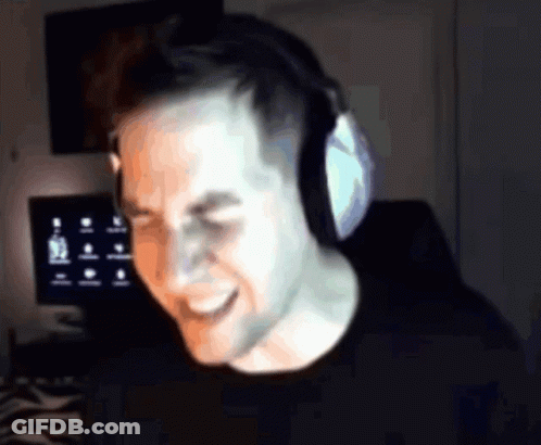 Man Wearing Headphones Smiling At Computer GIF