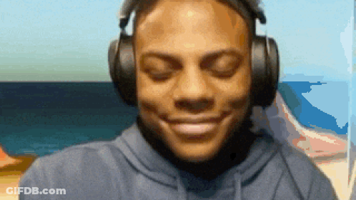 Man Wearing Headphones Smiling GIF