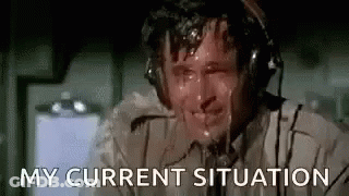 Man Wearing Headphones Sweating In Airplane GIF