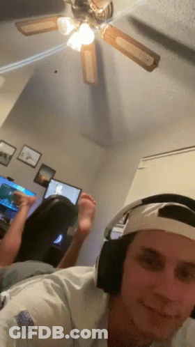Man Wearing Headphones Taking Selfie GIF