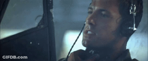 Man Wearing Headphones Talking On Phone GIF